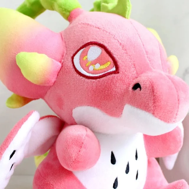 peluche dinosaure kawaii rose vue sur son visage