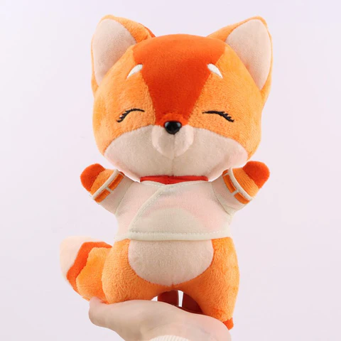 Peluche Renard Kawaii tenu a une main