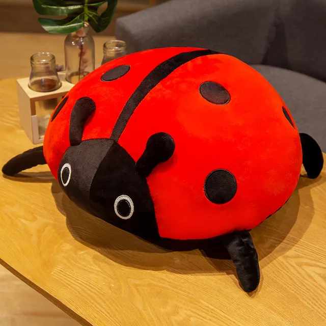 peluche coussin coccinelle rouge