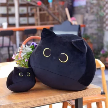 Peluche Chat Noir sur la table