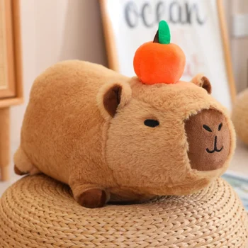 peluche capybara avec orange sur la tete