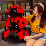 peluche coussin coccinelle