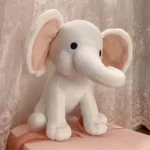 peluche elephant blanc assis