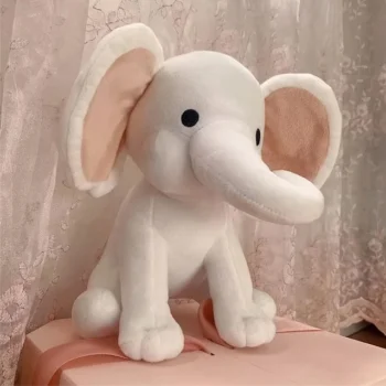 peluche elephant blanc assis