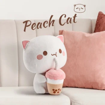 peluche neko kawaii avec son bubble tea sur le canapé