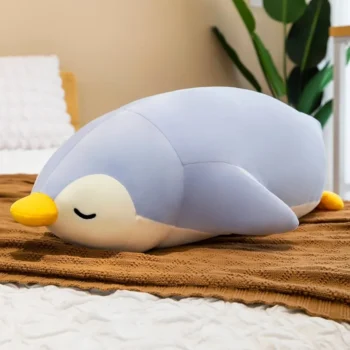 peluche pingouin kawaii bleu allongé