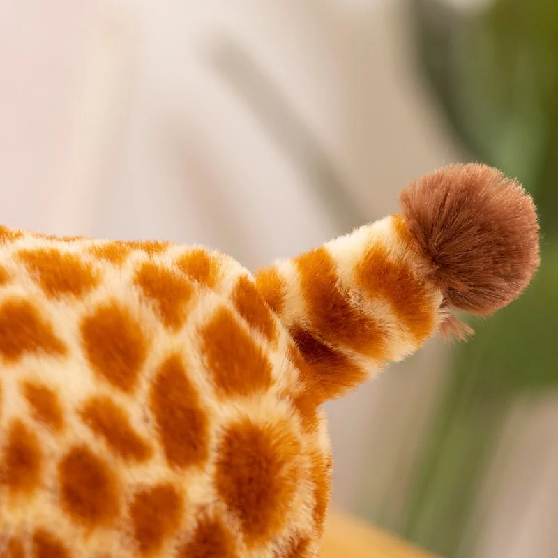 queue de la girafe en peluche kawaii