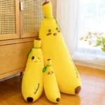 Peluche banane géante 35cm 50cm 70cm debout les unes contre les autres